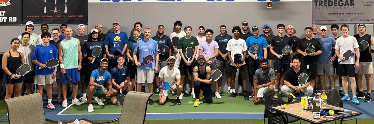 Players engaged in competitive pickleball match on outdoor courts
